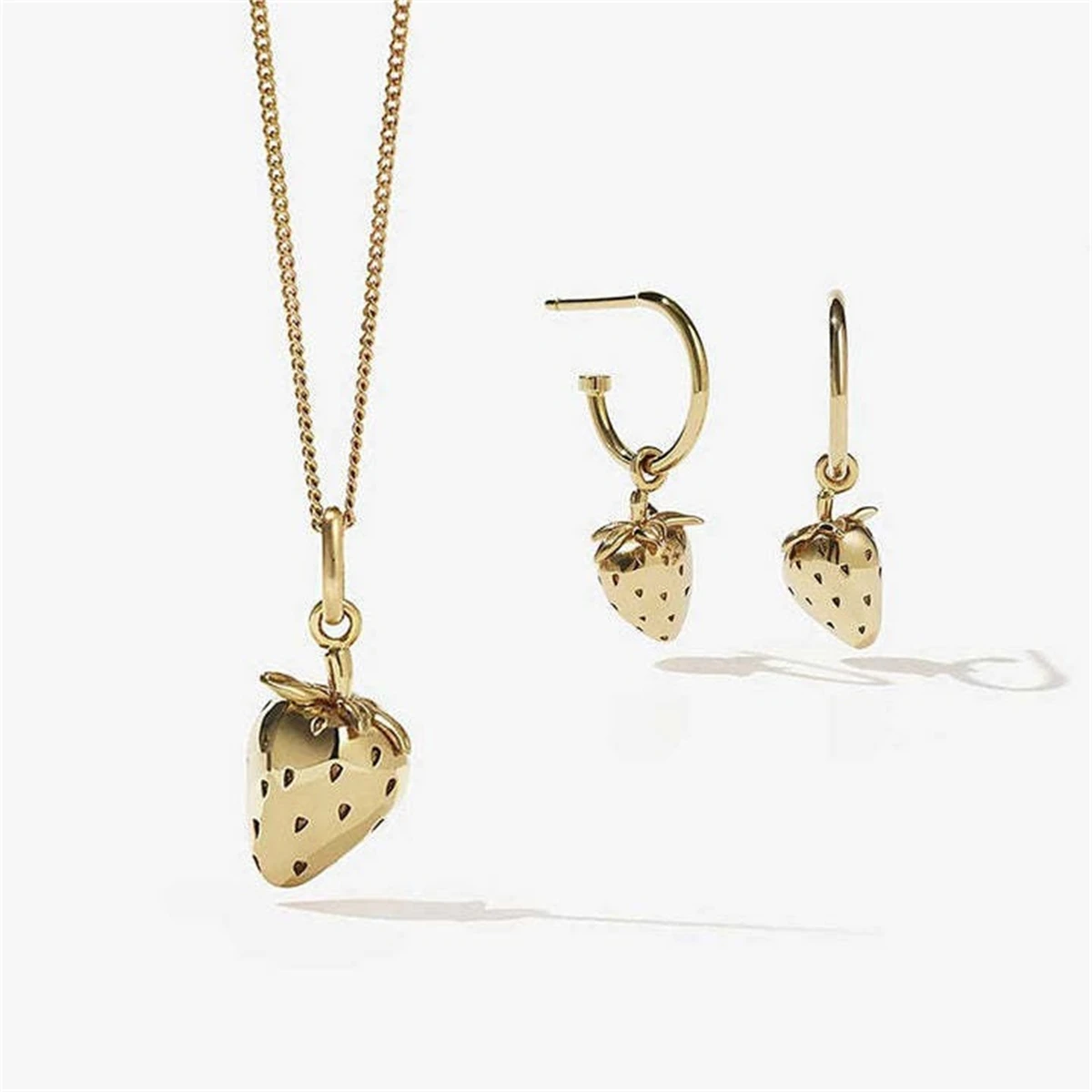 New European and American Sweet and Cute Gold Strawberry Pendant Necklace Earrings Copper Plated Gold Color Protection
New European and American Sweet and Cute Gold Strawberry Pendant Necklace Earrings Copper Plated Gold Color Protection