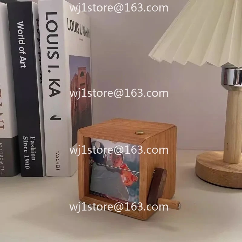 Mechanical hand crank dynamic photo album high sense black walnut handicrafts computer table ornament creative gift
Mechanical hand crank dynamic photo album high sense black walnut handicrafts computer table ornament creative gift