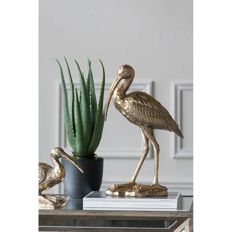Gold Finish Standing Crane Figurine 10x15.9x3.7 Inches
Gold Finish Standing Crane Figurine 10x15.9x3.7 Inches