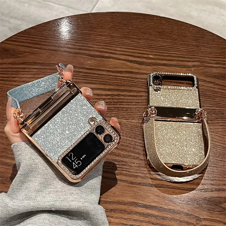Чехол для телефона Samsung Z flip4, складной W23flip, ремешок на запястье, блестящий порошок, гальваника, инкрустированный бриллиантами, защитный чехол 
Чехол для телефона Samsung Z flip4, складной W23flip, ремешок на запястье, блестящий порошок, гальваника, инкрустированный бриллиантами, защитный чехол