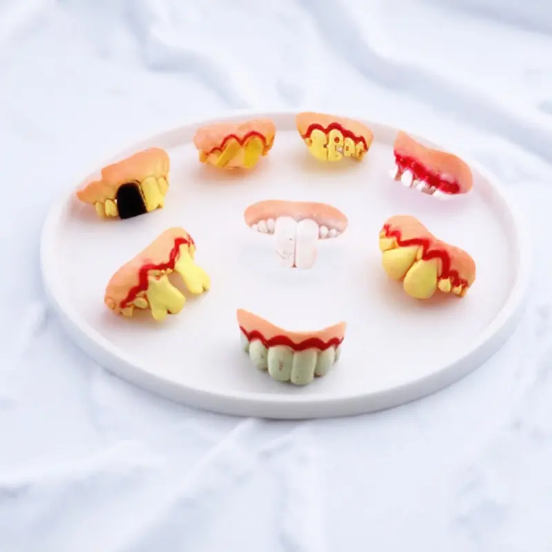 5Pcs Funny Wacky Artificial False Teeth Set Holey Cracked Chipped Wonky Blackened Teeth for Halloween Easter Masquerade Party
5Pcs Funny Wacky Artificial False Teeth Set Holey Cracked Chipped Wonky Blackened Teeth for Halloween Easter Masquerade Party