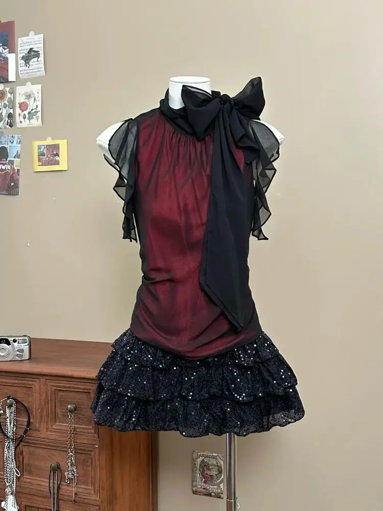 Шикарный наряд во французском стиле ретро Хепберн, женские лоскутные топы с бантом + мини-плиссированная юбка, новый летний модный винтажный комплект из 2 предметов 2025
Шикарный наряд во французском стиле ретро Хепберн, женские лоскутные топы с бантом + мини-плиссированная юбка, новый летний модный винтажный комплект из 2 предметов 2025