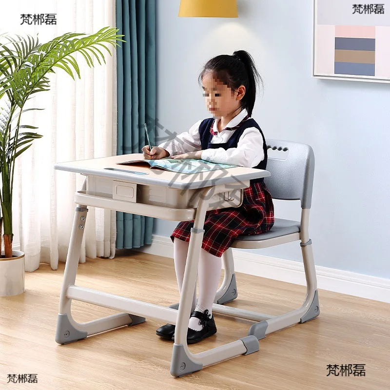 Children's and students' learning desks, desks and chairs, tutoring and custody training classes, school household adjustable de
Children's and students' learning desks, desks and chairs, tutoring and custody training classes, school household adjustable de