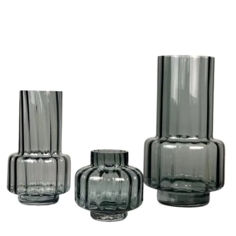Modern simple and versatile gray vertical striped glass vase soft decoration ornament flower arrangement handicraft
Modern simple and versatile gray vertical striped glass vase soft decoration ornament flower arrangement handicraft