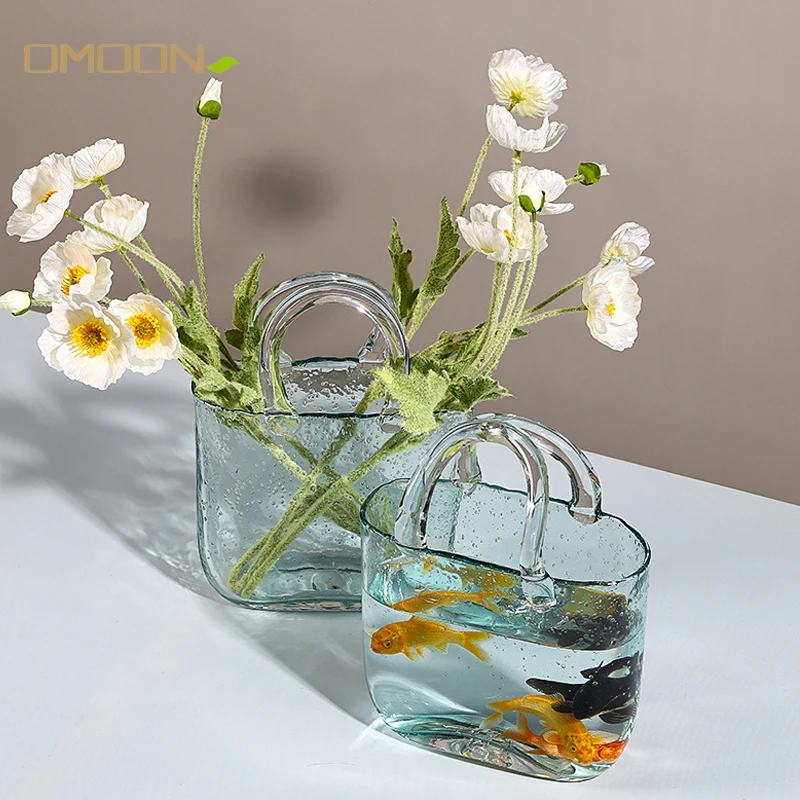 Nordic Glass Vase Handbag Shape Hydroponic Vase Flower Arrangement Transparent Glass Fish Tank Ornament Living Room Decoration
Nordic Glass Vase Handbag Shape Hydroponic Vase Flower Arrangement Transparent Glass Fish Tank Ornament Living Room Decoration