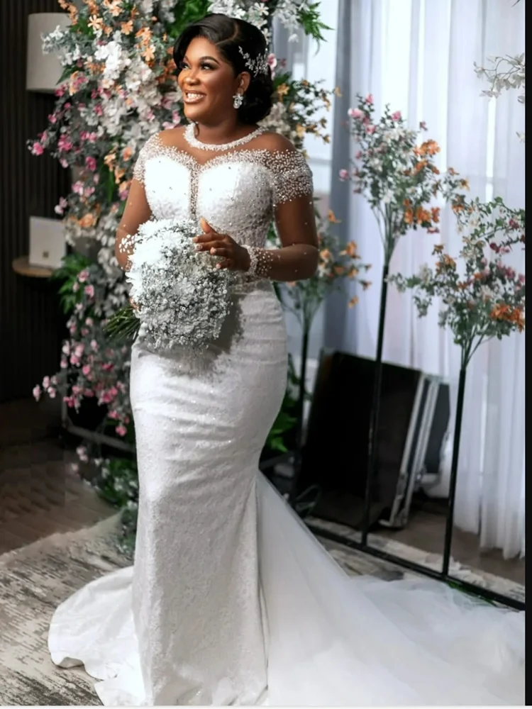 Customized O- Neck See Through Appliques Beads Wedding Dresses Robe De Mariée Vintage Long Sleeves African Bridal Gown
Customized O- Neck See Through Appliques Beads Wedding Dresses Robe De Mariée Vintage Long Sleeves African Bridal Gown