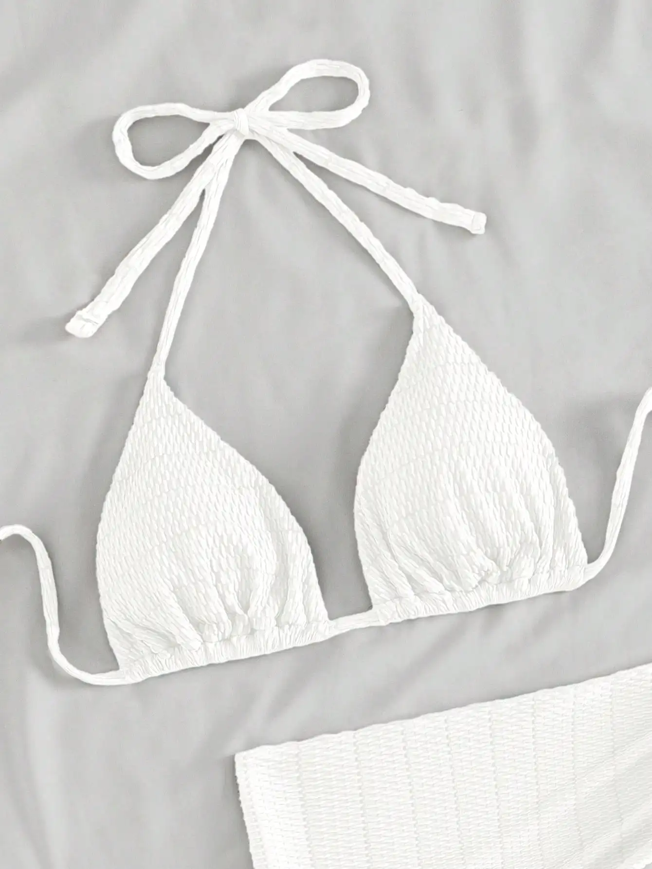 Women Solid Halter Tie Triangle Bikini Set With Cover-Up Skirt
Women Solid Halter Tie Triangle Bikini Set With Cover-Up Skirt