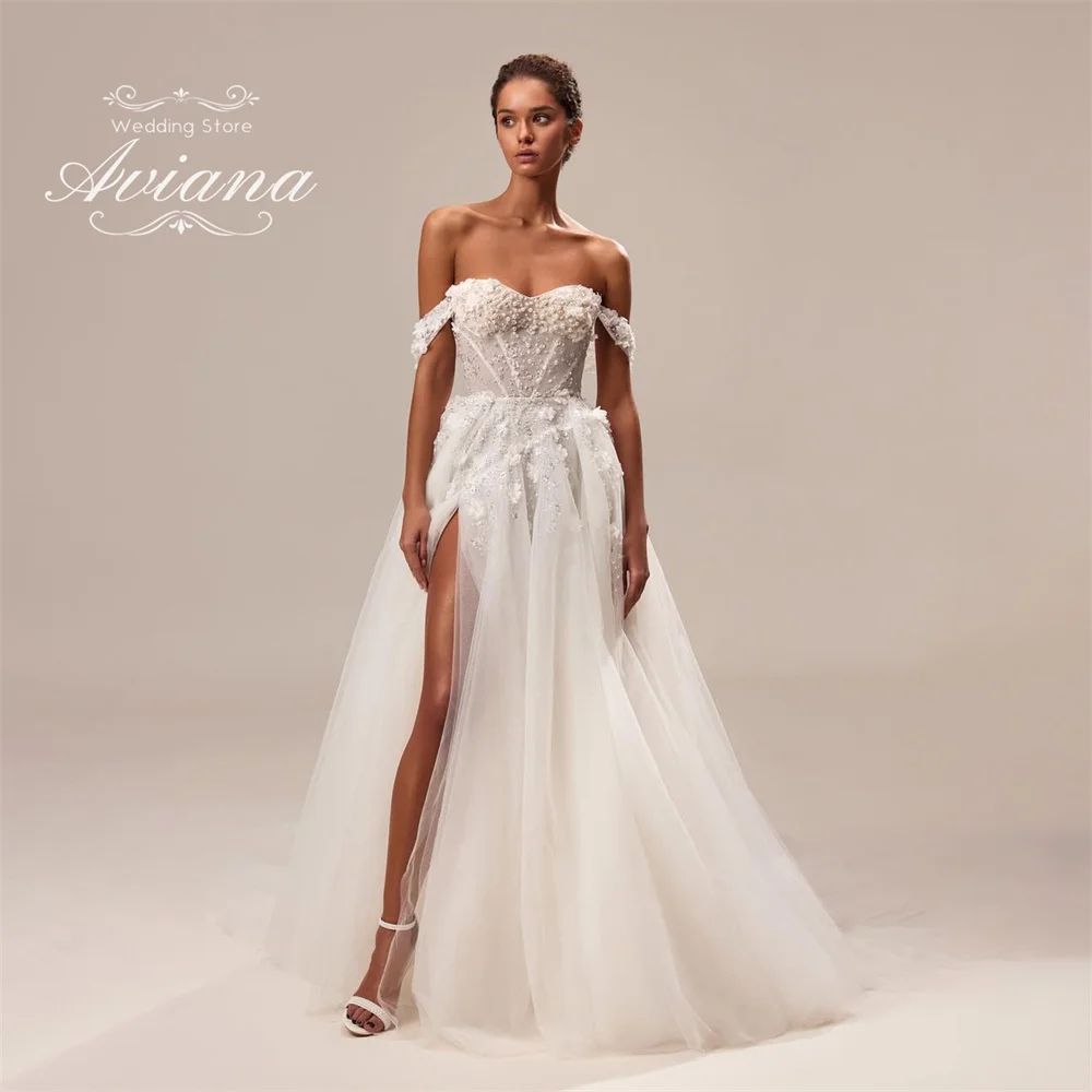 Aviana индивидуальное свадебное платье трапециевидной формы с открытыми плечами и высоким разрезом по бокам, жемчуг, аппликации, цветок, корсет со шлейфом
Aviana индивидуальное свадебное платье трапециевидной формы с открытыми плечами и высоким разрезом по бокам, жемчуг, аппликации, цветок, корсет со шлейфом