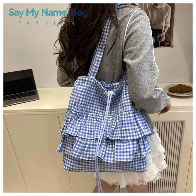 Модные клетчатые женские сумки с оборками на шнурке, простые женские сумки-тоут под мышками, большие вместительные сумки для девочек
Модные клетчатые женские сумки с оборками на шнурке, простые женские сумки-тоут под мышками, большие вместительные сумки для девочек