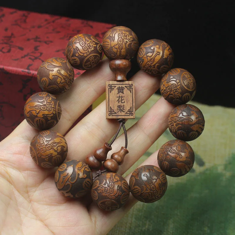 Custom Huanghuali Carved Buddha Beads Small Leaf Red Sandalwood Bracelet20mm Ethnic Style Prayer Beads Bracelets for Men and Wom
Custom Huanghuali Carved Buddha Beads Small Leaf Red Sandalwood Bracelet20mm Ethnic Style Prayer Beads Bracelets for Men and Wom