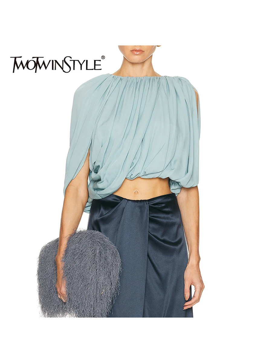 TWOTWINSTYLE Temperament Spliced Folds Shirts for Women Round Neck One Shoulder Loose Solid Irrgular Blouse Female Fashion 2026
TWOTWINSTYLE Temperament Spliced Folds Shirts for Women Round Neck One Shoulder Loose Solid Irrgular Blouse Female Fashion 2026