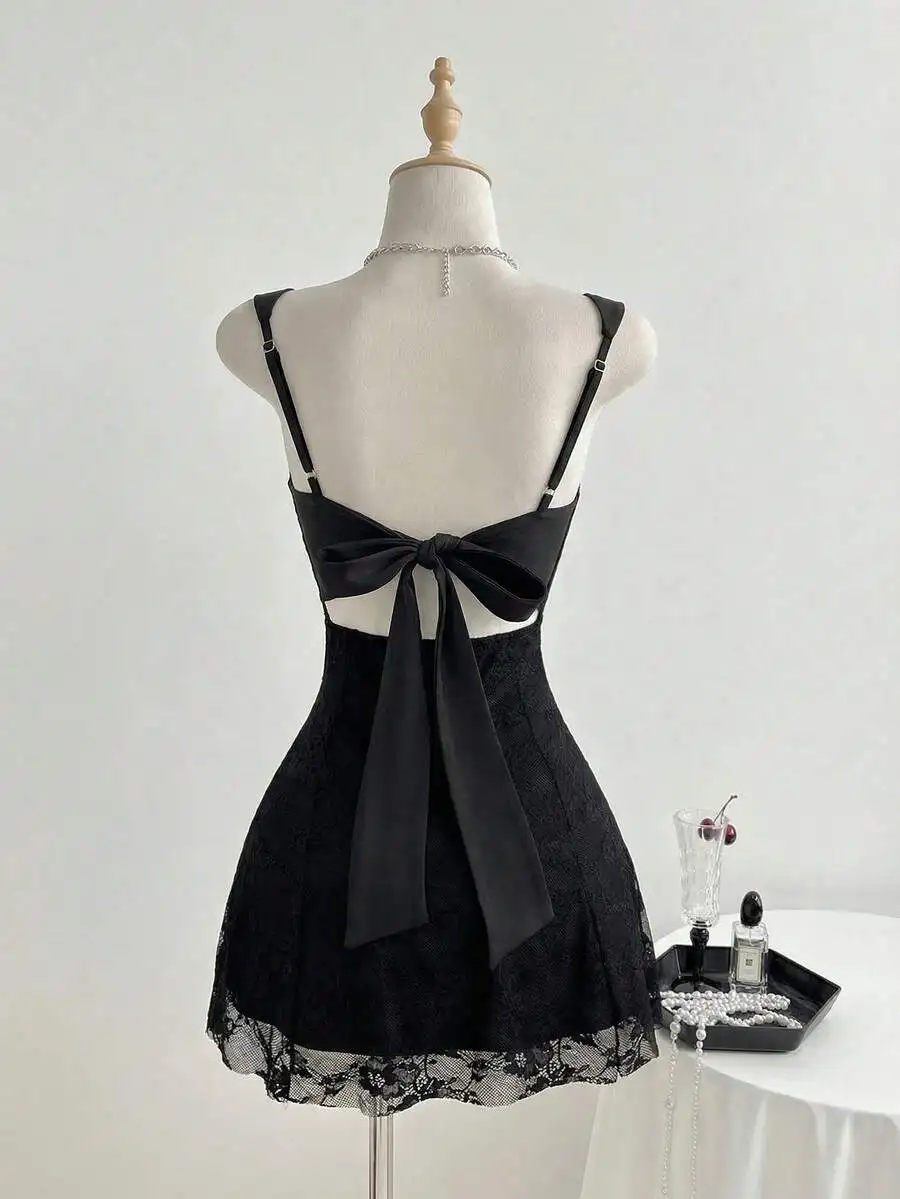Womens Black Lace Backless Dress With Bow Tie Waist Cinched Sleeveless Sexy Vintage Style
Womens Black Lace Backless Dress With Bow Tie Waist Cinched Sleeveless Sexy Vintage Style