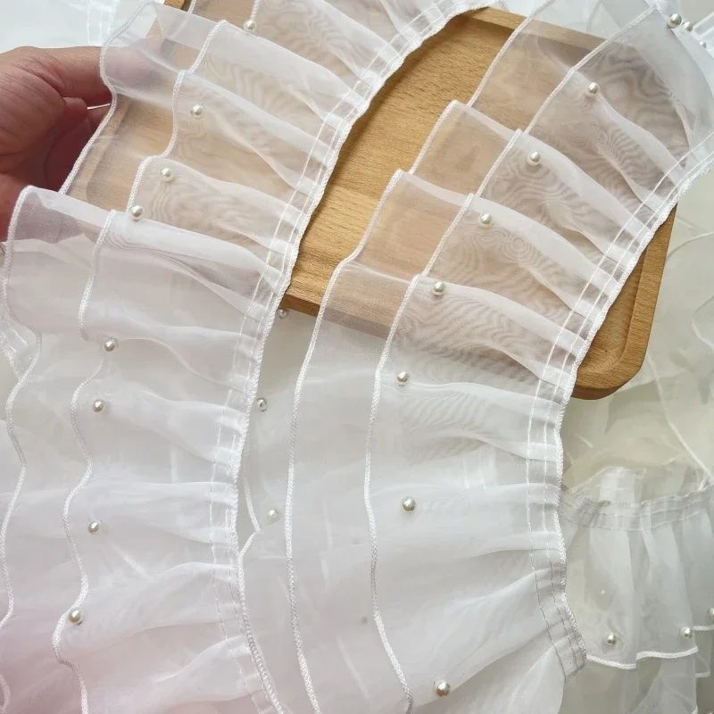 Двухслойная плиссированная ткань из белой тюлевой пряжи, бахрома из бисера, кружевная отделка краев, ткань с воротником свадебного платья, декор для шитья своими руками
Двухслойная плиссированная ткань из белой тюлевой пряжи, бахрома из бисера, кружевная отделка краев, ткань с воротником свадебного платья, декор для шитья своими руками