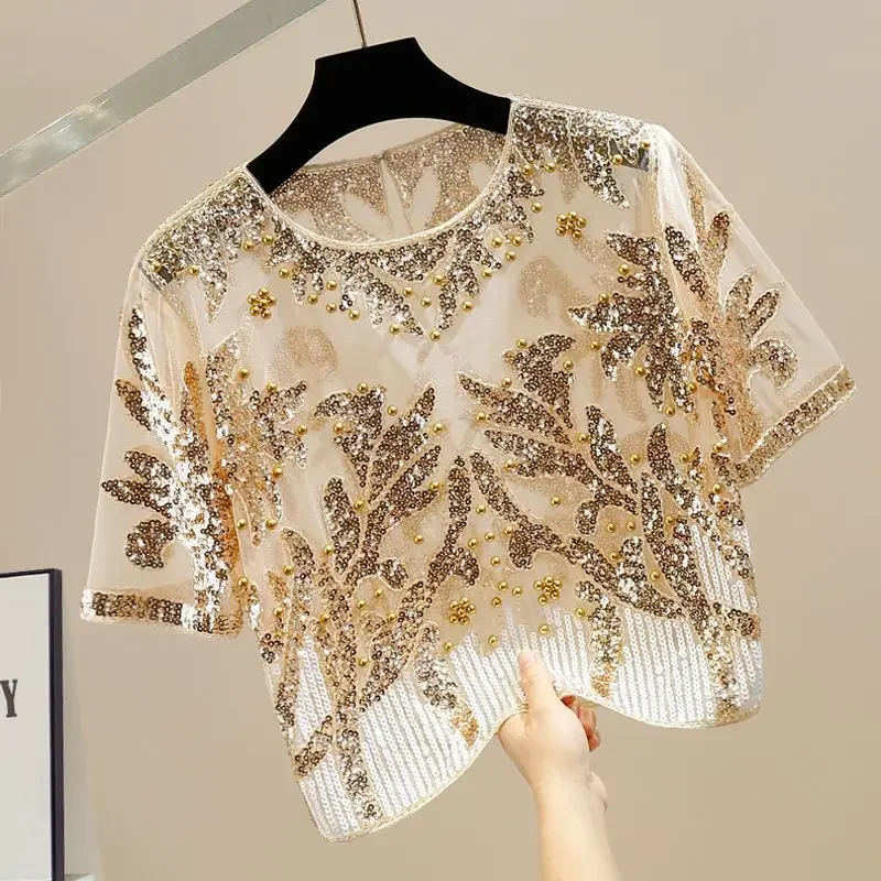 Luxury Heavy Beading Sequined Patchwork Women Tops O-Neck Short Sleeve Bling Blouse New Summer See-through Thin Shirts Trendy
Luxury Heavy Beading Sequined Patchwork Women Tops O-Neck Short Sleeve Bling Blouse New Summer See-through Thin Shirts Trendy