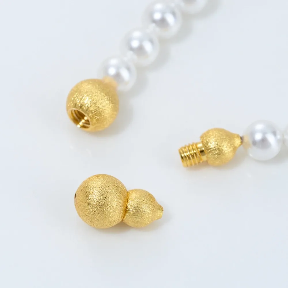 Медные застежки, 18-каратное золото, спиральная пуговица, матовая тыква, жемчужное ожерелье ручной работы, браслет, кнопка подключения, аксессуары для головы
Медные застежки, 18-каратное золото, спиральная пуговица, матовая тыква, жемчужное ожерелье ручной работы, браслет, кнопка подключения, аксессуары для головы