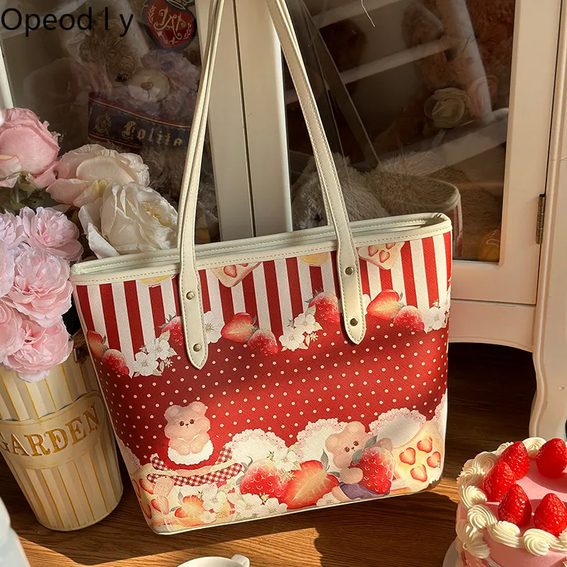Lolita Original Design Strawberry Print Versatile Shoulder Bag Large Capacity Storage Mother Child Bag Casual Women Handbag
Lolita Original Design Strawberry Print Versatile Shoulder Bag Large Capacity Storage Mother Child Bag Casual Women Handbag