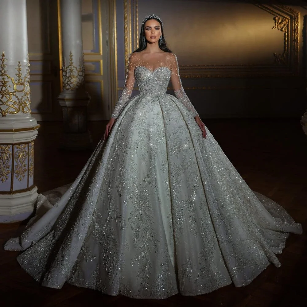 Exquisite Sequined Beads Wedding Dress Illusion O-neck Long Sleeve Bridal Gown Customized Ball Gowns Dresses For Bride
Exquisite Sequined Beads Wedding Dress Illusion O-neck Long Sleeve Bridal Gown Customized Ball Gowns Dresses For Bride