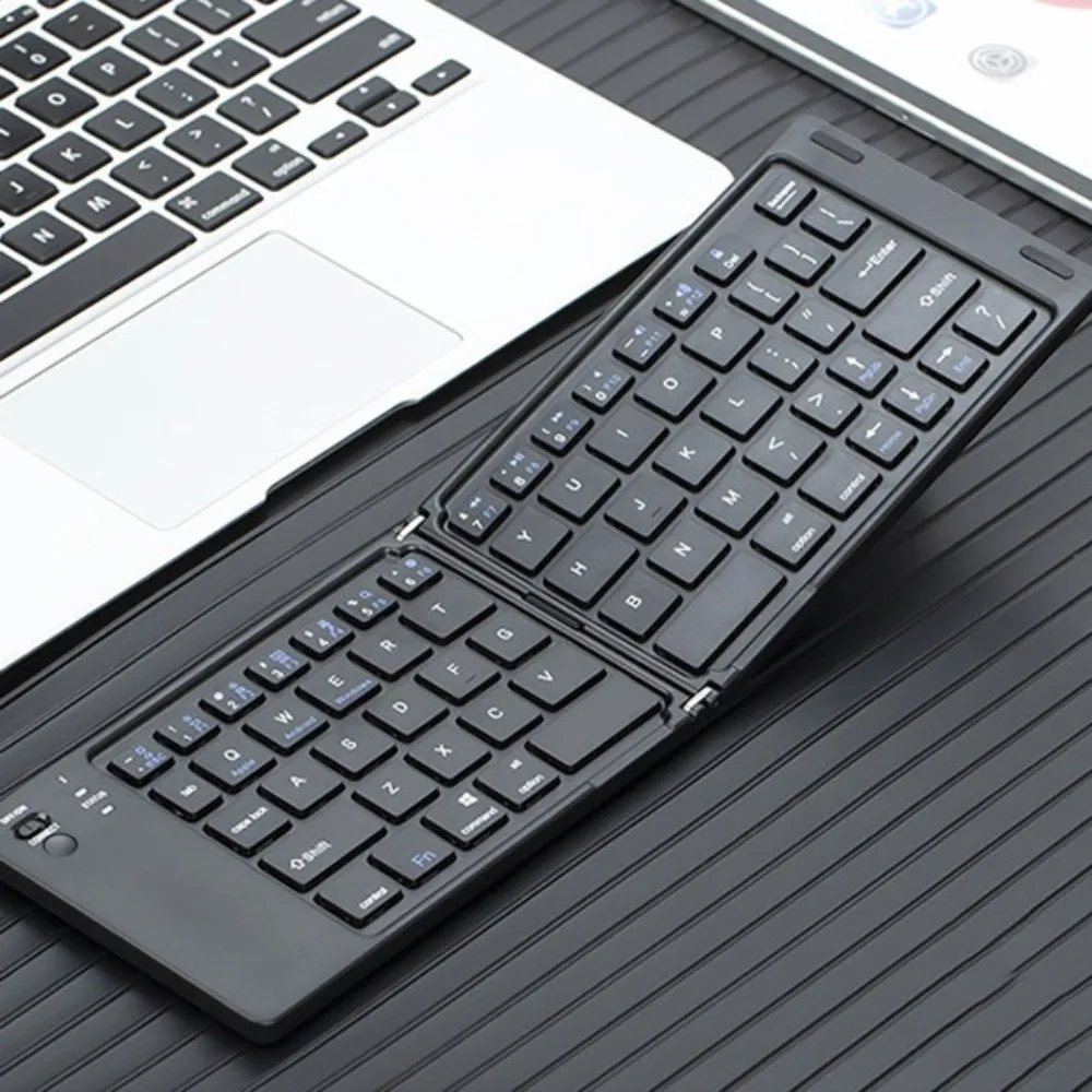 Mini Wireless Folding Keyboard Slim Design Lightweight Bluetooth Keyboard Portable Rechargeable Foldable Keyboard Notebook
Mini Wireless Folding Keyboard Slim Design Lightweight Bluetooth Keyboard Portable Rechargeable Foldable Keyboard Notebook