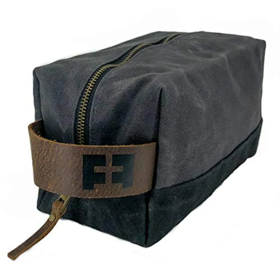 the DOPP KIT Waxed Cotton Canvas shave and toiletries bag with leather handle
the DOPP KIT Waxed Cotton Canvas shave and toiletries bag with leather handle