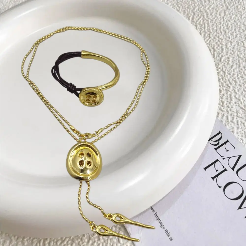 2026 Spain niche design gold silver button bracelet necklace jewelry two-piece creative gift set
2026 Spain niche design gold silver button bracelet necklace jewelry two-piece creative gift set
