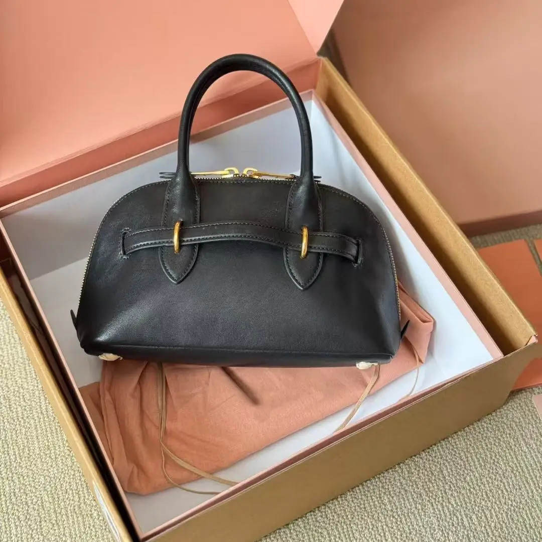 High quality leather shell women's bag 2025 new retro bowling bag commuter Joker handbag advanced women's shoulder bag
High quality leather shell women's bag 2025 new retro bowling bag commuter Joker handbag advanced women's shoulder bag