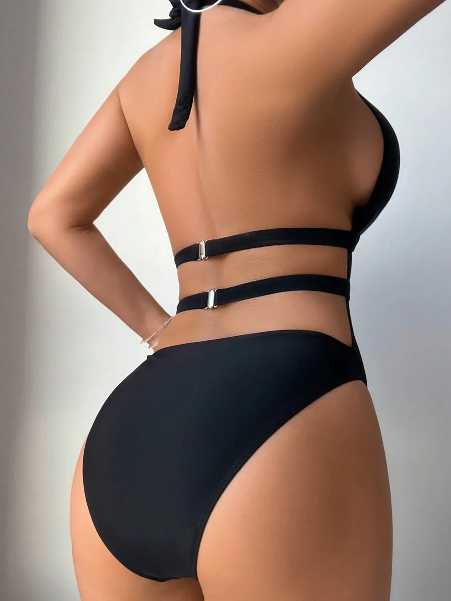Womens One-Piece Swimsuit With Halter Neck And Cut-Out Back
Womens One-Piece Swimsuit With Halter Neck And Cut-Out Back