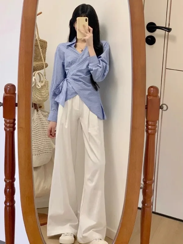 Женская рубашка в синюю полоску с зауженной талией, маленьким воротником, больших размеров, в корейском стиле, для повседневной носки, из полиэфирного волокна, с длинными рукавами
Женская рубашка в синюю полоску с зауженной талией, маленьким воротником, больших размеров, в корейском стиле, для повседневной носки, из полиэфирного волокна, с длинными рукавами