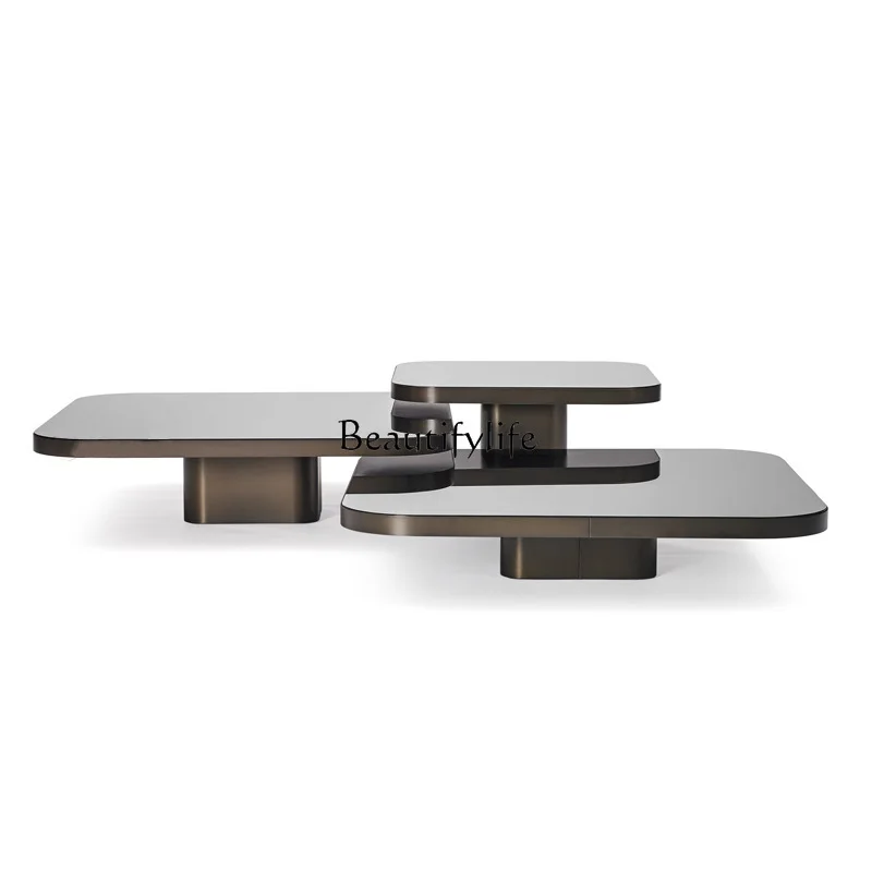 Modern light luxury living room combination coffee table metal rounded corner square high and low tea table
Modern light luxury living room combination coffee table metal rounded corner square high and low tea table