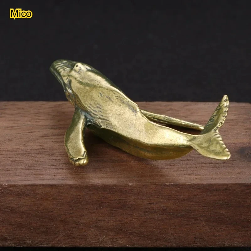 Old handmade brass whale ornaments, antique bronze ware, creative tea pet decoration, study, office desk, handicrafts collection
Old handmade brass whale ornaments, antique bronze ware, creative tea pet decoration, study, office desk, handicrafts collection