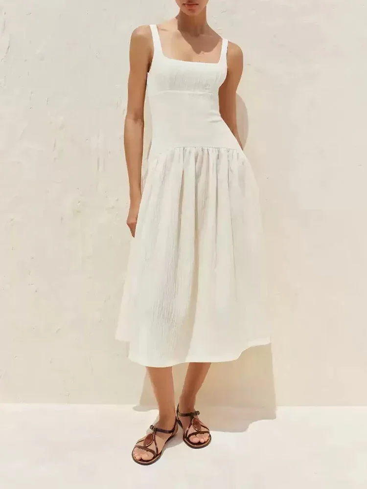 European and American style summer new women's French style sweet waist textured backless square neck suspender midi dress
European and American style summer new women's French style sweet waist textured backless square neck suspender midi dress