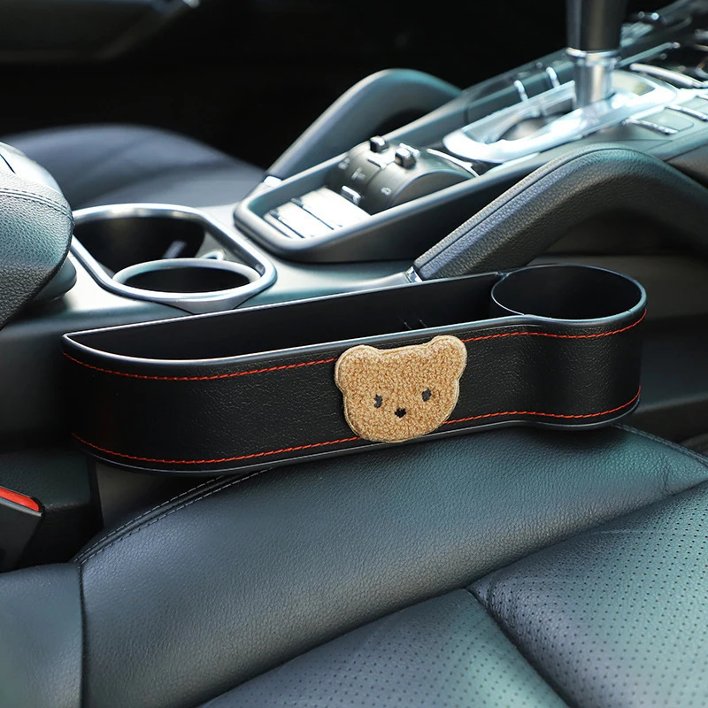 Car seat gap storage box, cartoon car gap storage box, storage bag, interior accessories, bear-themed car accessory
Car seat gap storage box, cartoon car gap storage box, storage bag, interior accessories, bear-themed car accessory