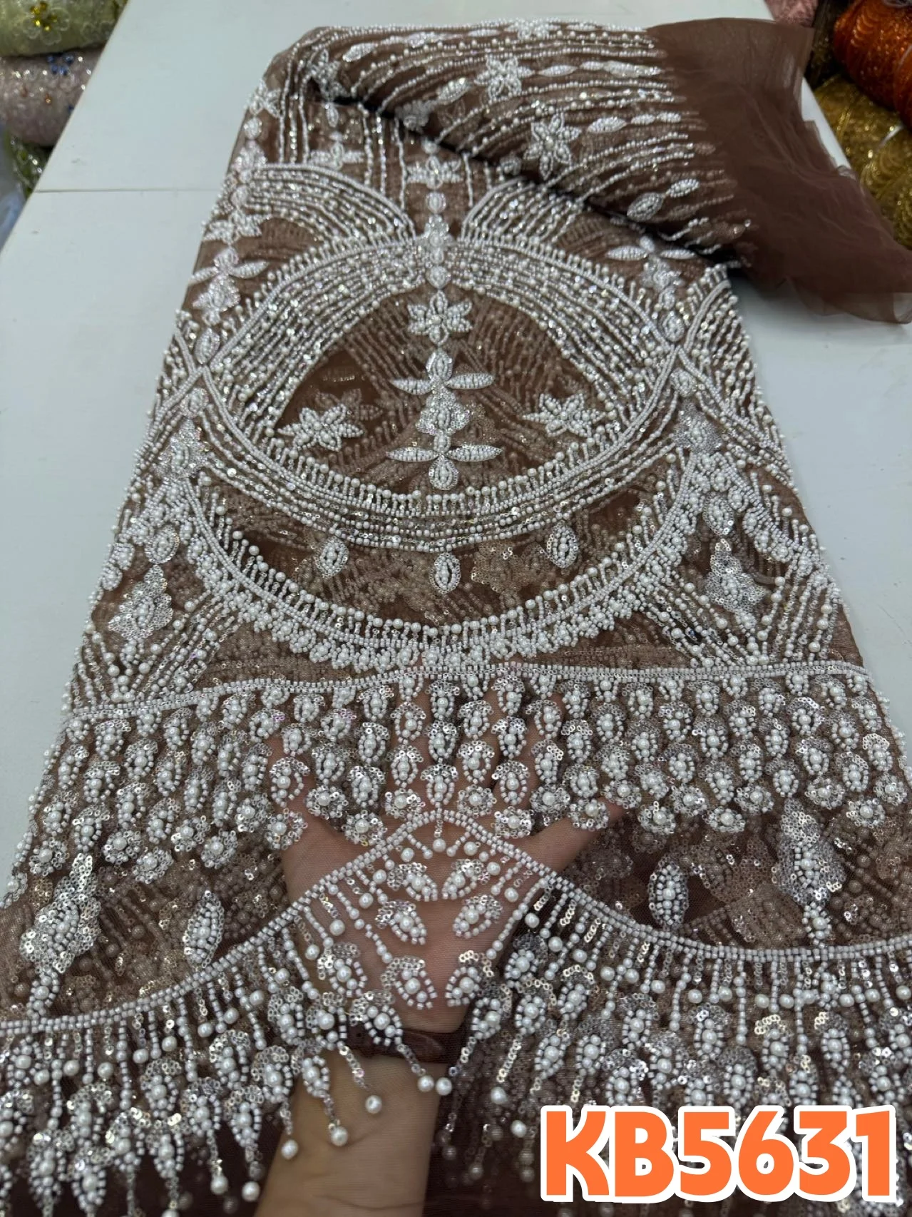 YALISI African Beads Lace Fabric High Quality 2026 Brown Beaded Lace Fabric White Tulle Fabric For Wedding Dress Sewing KB5631
YALISI African Beads Lace Fabric High Quality 2026 Brown Beaded Lace Fabric White Tulle Fabric For Wedding Dress Sewing KB5631