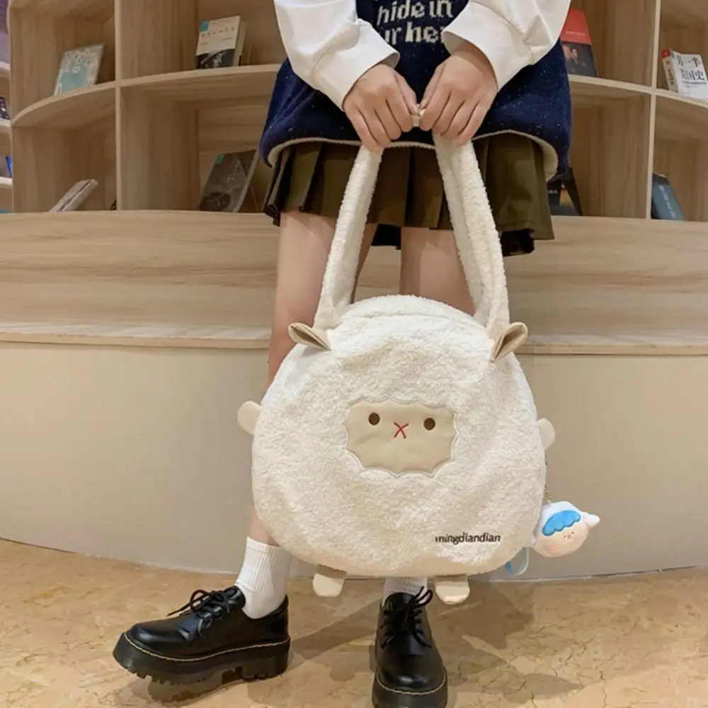 Lovely Large Capacity Sheep Plush Shoulder Bag Korean Style Kawaii Warm Tote Bag with Pendant Soft Animal Doll Handbag Outdoor
Lovely Large Capacity Sheep Plush Shoulder Bag Korean Style Kawaii Warm Tote Bag with Pendant Soft Animal Doll Handbag Outdoor