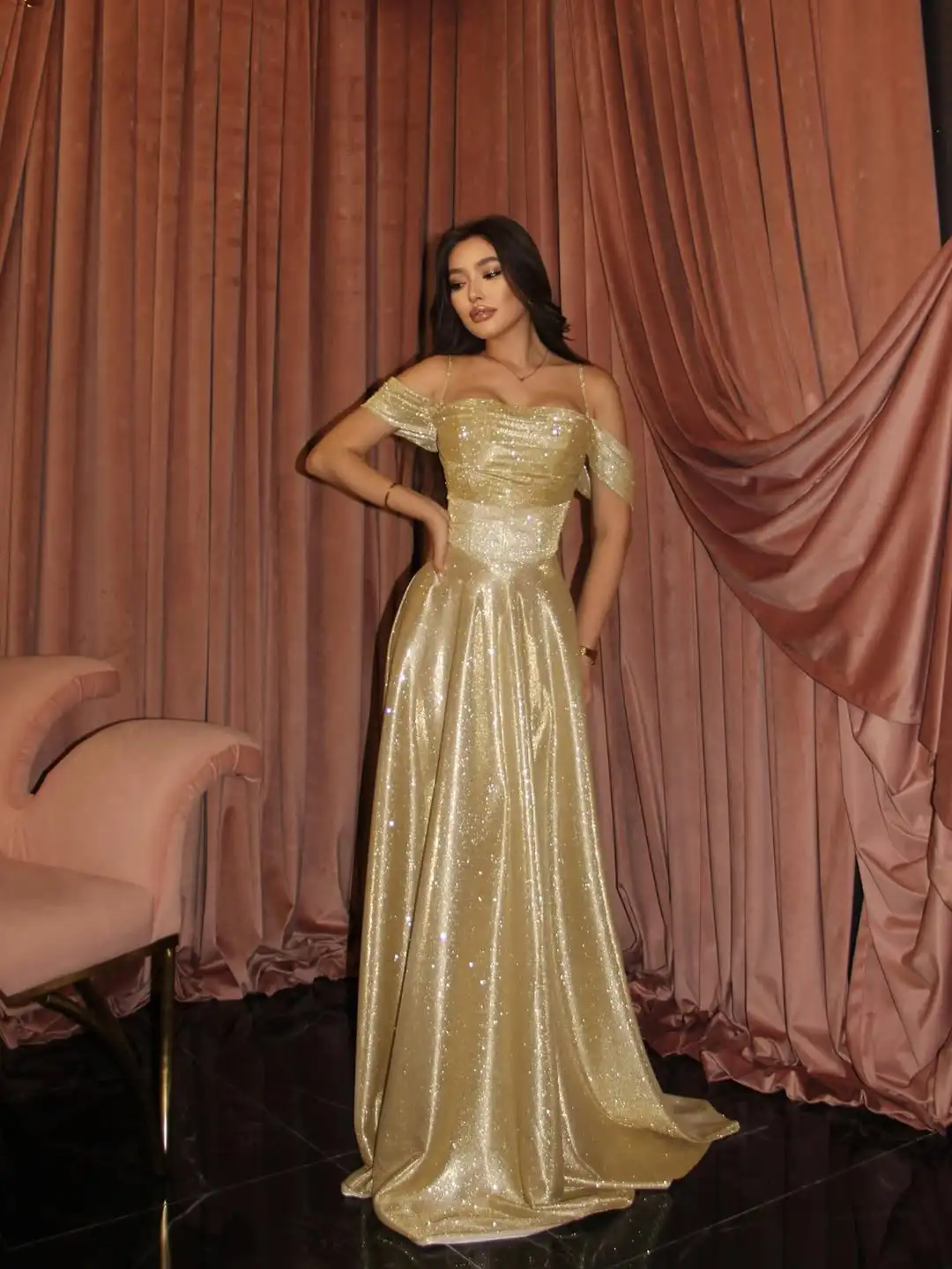 Gold Sequin Off-Shoulder Maxi Dress with Draped Sleeves | Glittery Elegant Evening Gown for Party
Gold Sequin Off-Shoulder Maxi Dress with Draped Sleeves | Glittery Elegant Evening Gown for Party