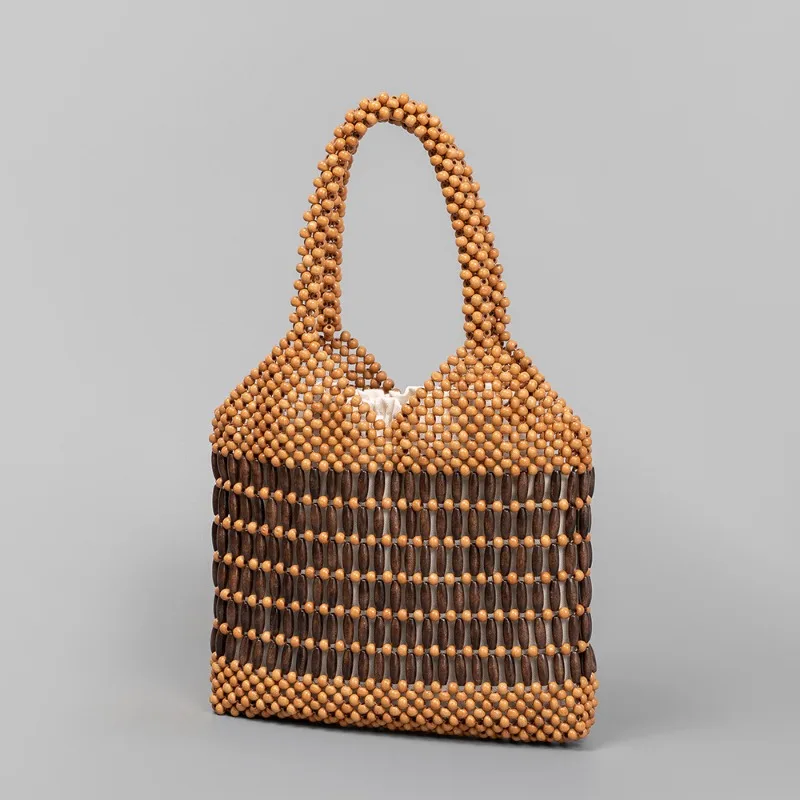 Handmade Woven Beach Bag Women's Island Vacation Contrasting Wooden Beads Tote Bags Boho Style Large Capacity New Eco Handbag
Handmade Woven Beach Bag Women's Island Vacation Contrasting Wooden Beads Tote Bags Boho Style Large Capacity New Eco Handbag
