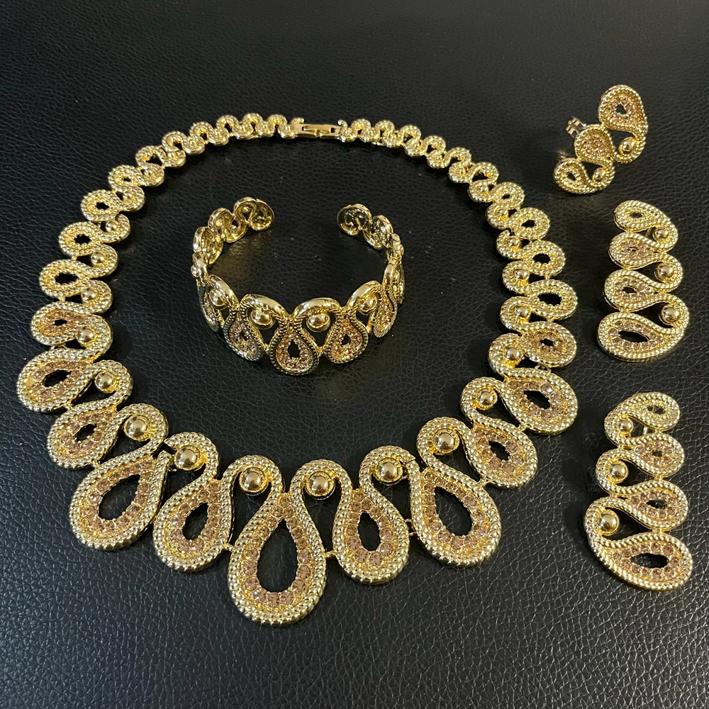 Vintage Rhinestones-Encrusted Teardrop Jewelry Set Gold Plated Statement Necklace Earrings Bracelet Ring African Dubai Styles
Vintage Rhinestones-Encrusted Teardrop Jewelry Set Gold Plated Statement Necklace Earrings Bracelet Ring African Dubai Styles