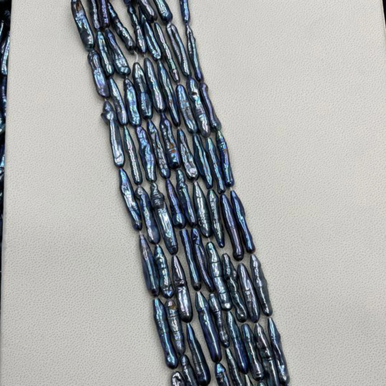 Натуральный жемчуг 8x30-9x33 мм, сине-фиолетовый, прямоугольный, барочный, пресноводный, для ожерелья, материалы для рукоделия, аксессуары, оптовая продажа ювелирных изделий
Натуральный жемчуг 8x30-9x33 мм, сине-фиолетовый, прямоугольный, барочный, пресноводный, для ожерелья, материалы для рукоделия, аксессуары, оптовая продажа ювелирных изделий