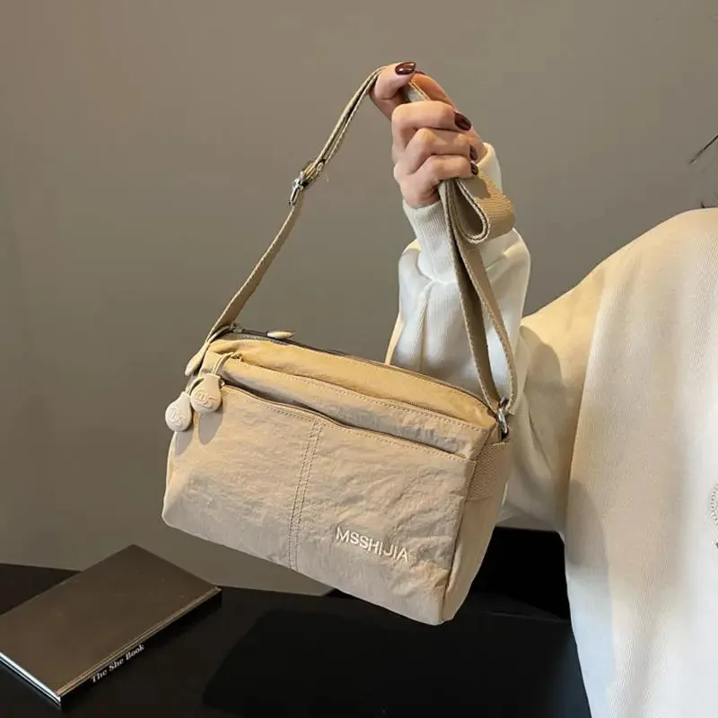 Casual Women's Shoulder Bag - Large Crossbody Messenger Purse with Zipper Closure - Everyday Use Nylon Tote
Casual Women's Shoulder Bag - Large Crossbody Messenger Purse with Zipper Closure - Everyday Use Nylon Tote