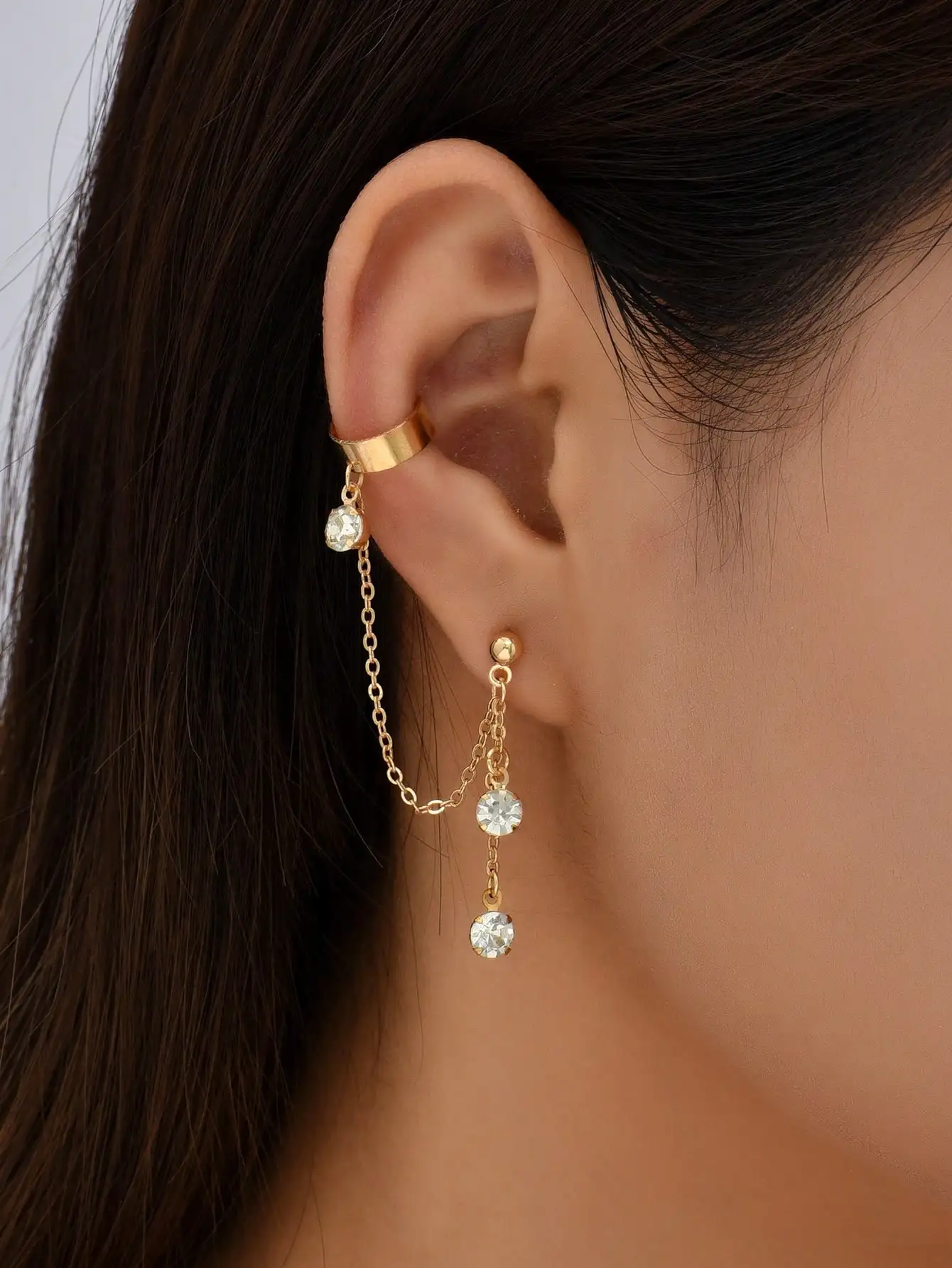 Gold Tone Ear Cuff & Stud Earring Set with Crystal Drops, Hip Hop Style
Gold Tone Ear Cuff & Stud Earring Set with Crystal Drops, Hip Hop Style