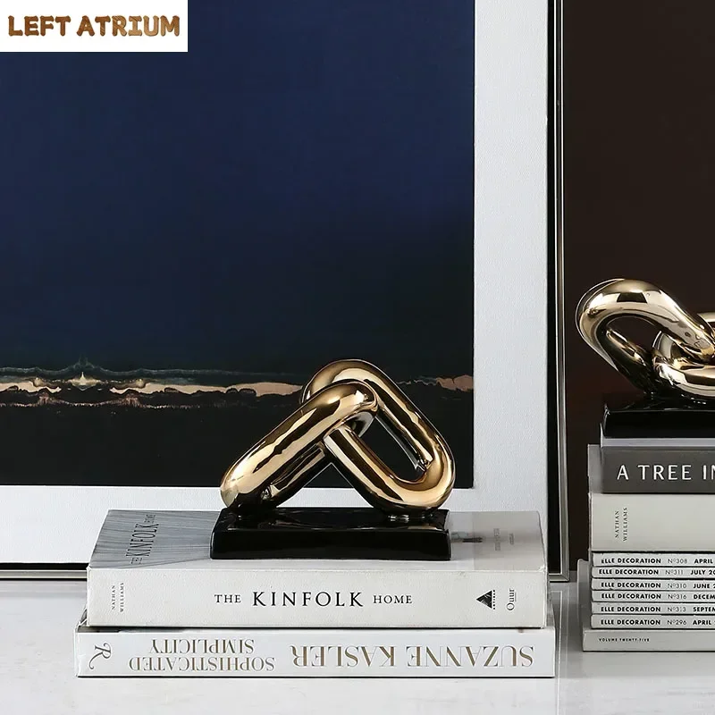 Nordic Golden Chain Statue Office Study Desktop Decor Ceramics Ring Chain Crafts Statuette Porcelain Crafts Home Decoration 
Nordic Golden Chain Statue Office Study Desktop Decor Ceramics Ring Chain Crafts Statuette Porcelain Crafts Home Decoration