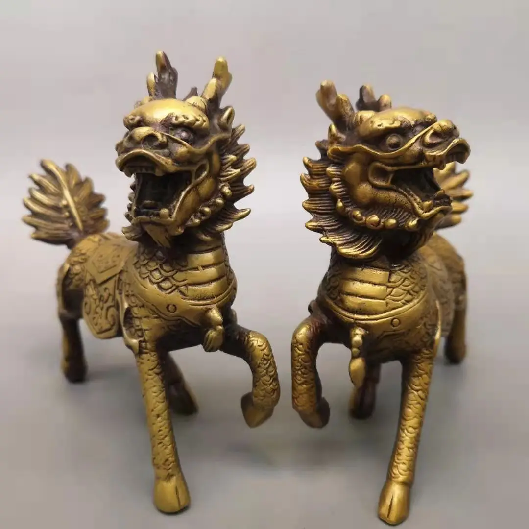 Chinese retro crafts carved brass qilin a pair of home desktop feng shui auspicious ornaments and decorations
Chinese retro crafts carved brass qilin a pair of home desktop feng shui auspicious ornaments and decorations