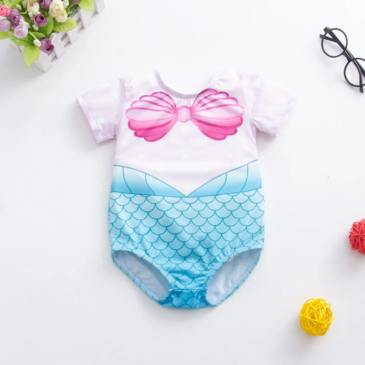 1-7 year old summer new newborn baby girl short sleeved elastic round neck fish scale printed cute one piece swimsuit
1-7 year old summer new newborn baby girl short sleeved elastic round neck fish scale printed cute one piece swimsuit
