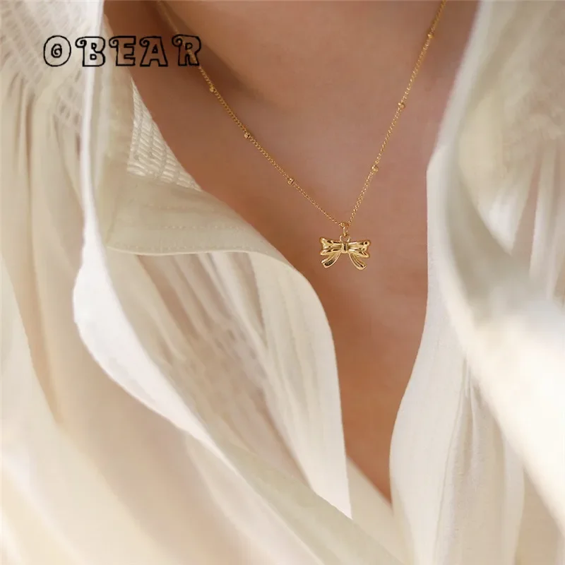 Korea Sweet PrincBow Pendant Necklace Clavicle Chain for Women StainlSteel Plated 18K Gold Jewelry Wholesale
Korea Sweet PrincBow Pendant Necklace Clavicle Chain for Women StainlSteel Plated 18K Gold Jewelry Wholesale