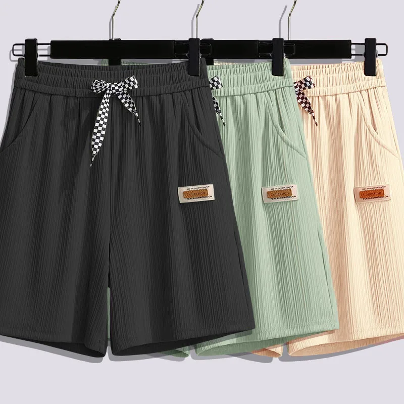 Ice silk shorts for women in summer, slim fit, loose fit, high waisted straight leg mid length pants, casual wide leg pants, spo
Ice silk shorts for women in summer, slim fit, loose fit, high waisted straight leg mid length pants, casual wide leg pants, spo