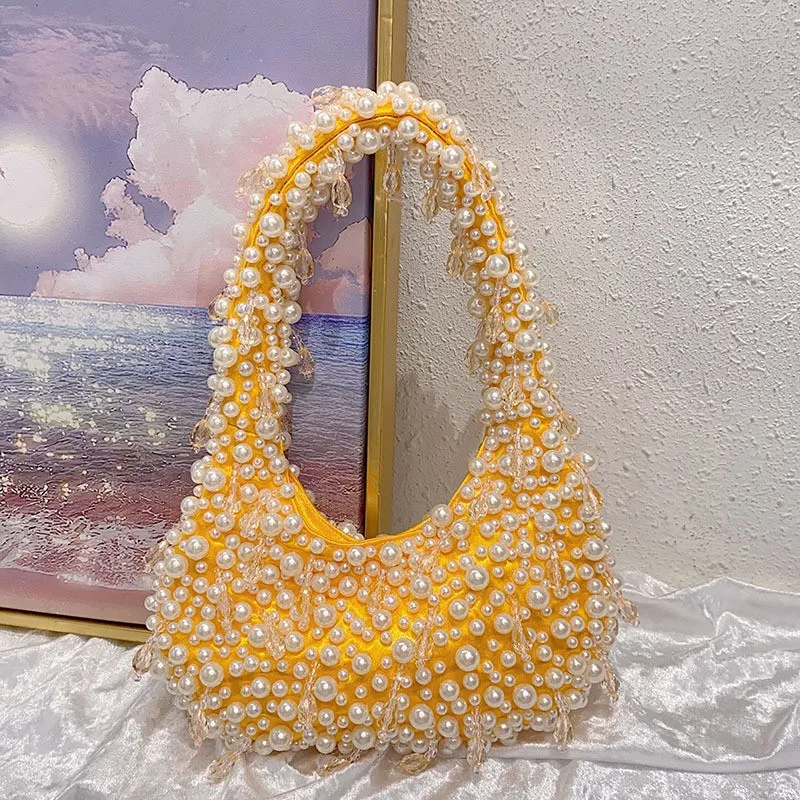 versatile casual pearl crystal beaded fashion niche design portable shoulder armpit bag
versatile casual pearl crystal beaded fashion niche design portable shoulder armpit bag