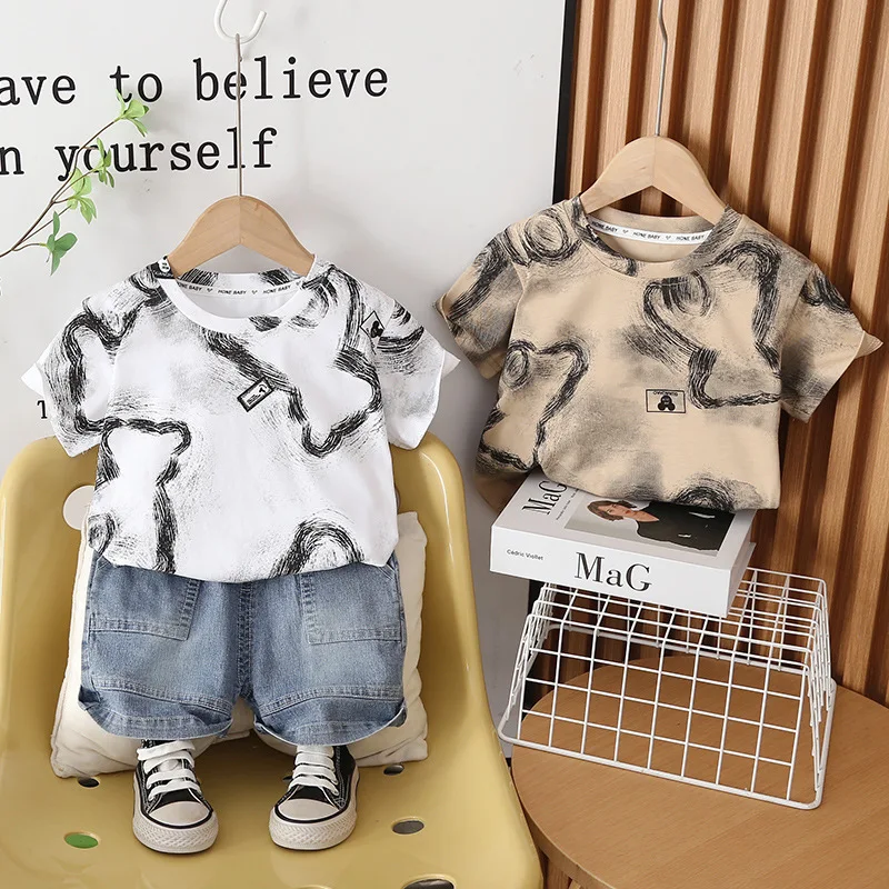 Летняя одежда для маленьких мальчиков, детская футболка с принтом и джинсовые шорты, комплект из 2 предметов, модные дышащие детские уличные комплекты для детей 1-5 лет
Летняя одежда для маленьких мальчиков, детская футболка с принтом и джинсовые шорты, комплект из 2 предметов, модные дышащие детские уличные комплекты для детей 1-5 лет