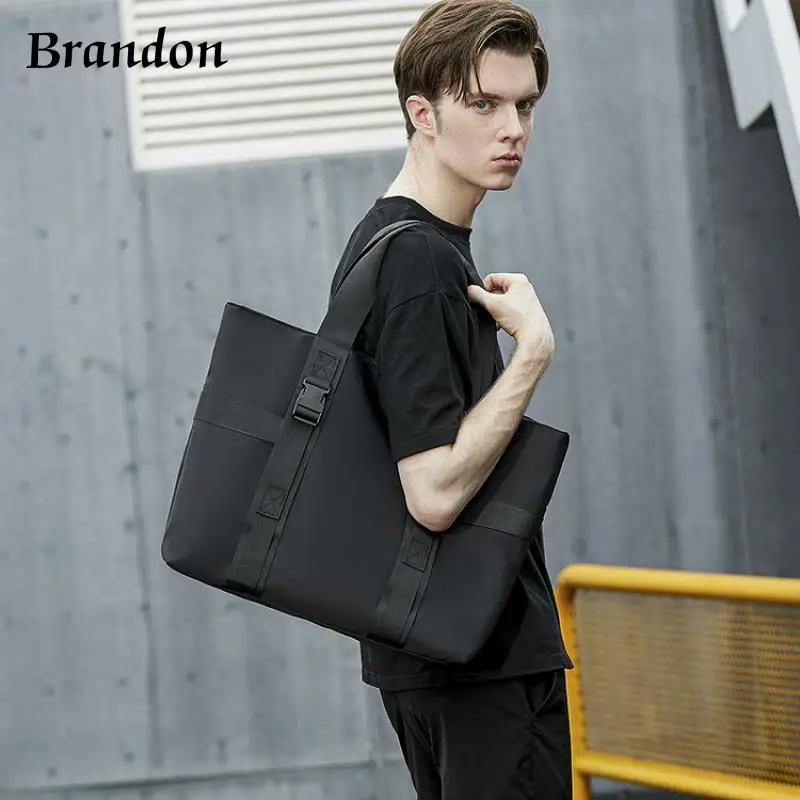 Korean men's fashionable handbag large capacity single shoulder tote bag, solid color casual waterproof travel bag for students
Korean men's fashionable handbag large capacity single shoulder tote bag, solid color casual waterproof travel bag for students