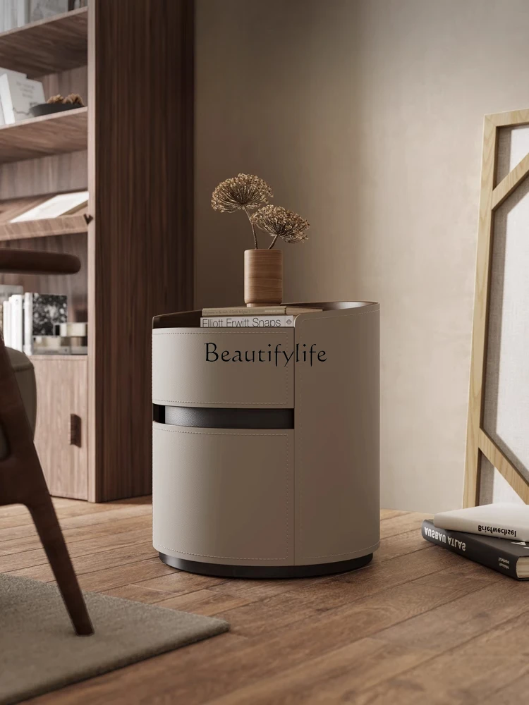 Italian minimalist imported saddle leather round bedside table size apartment bedroom storage solid wood bedside cabinet
Italian minimalist imported saddle leather round bedside table size apartment bedroom storage solid wood bedside cabinet