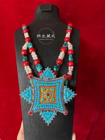 Китайская коробка Xizang в этническом стиле Gawu, тибетское ожерелье, кулон с аксессуарами
Китайская коробка Xizang в этническом стиле Gawu, тибетское ожерелье, кулон с аксессуарами