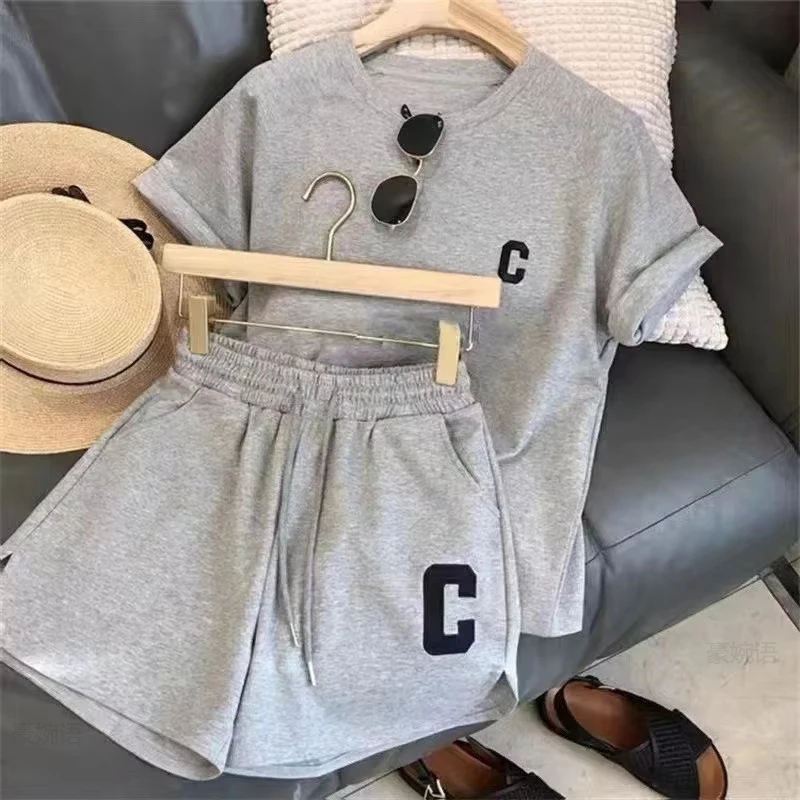  2 Piece Set Women Summer Loose Short Sleeve T-Shirt Casual Shorts Sports Print Letter Casual Suit Large Size Short Pajamas
2 Piece Set Women Summer Loose Short Sleeve T-Shirt Casual Shorts Sports Print Letter Casual Suit Large Size Short Pajamas